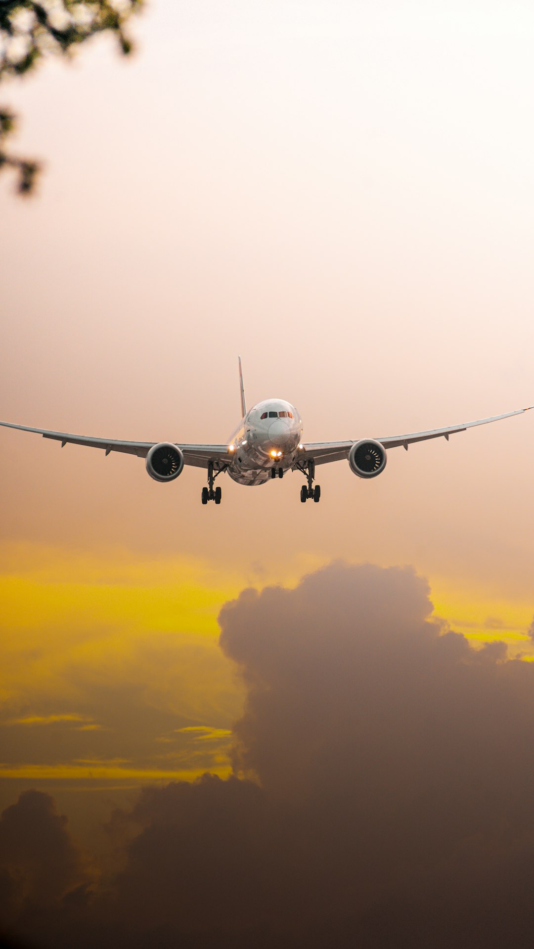 About a-large-jetliner-flying-through-a-cloudy-sky-4pr5w1ho2bw